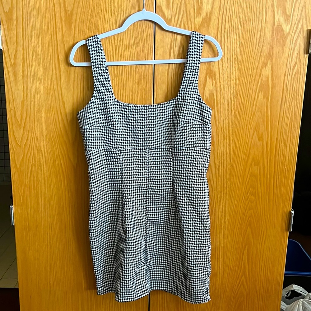 brand new,fits very well (if under 5’3 it is a little longer than a mini dress)